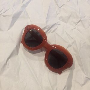 burnt orange oversized sunglasses